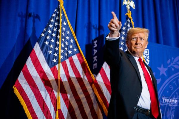 Republican presidential candidate and former President Do<em></em>nald Trump points to supporters during the campaign rally at Atkinson Country Club on Jan. 16, 2024 in Atkinson, New Hampshire. 
