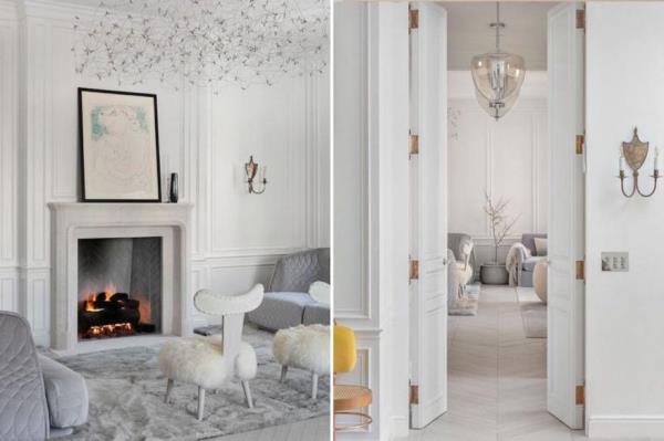 It's decorated in shades of white and gray, with glittery chandeliers throughout.