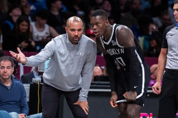 Nets head coach Jordi Fernandez speaks to Dennis Schroder #17 of the Brooklyn Nets on the sideline in the second half at Barclays Center, Sunday, Oct. 27, 2024, in Brooklyn, NY. 