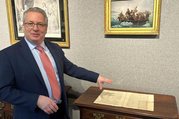 Historian Seth Kaller shows off a 1787 copy of the U.S. Co<em></em>nstitution that will be put up for auction.