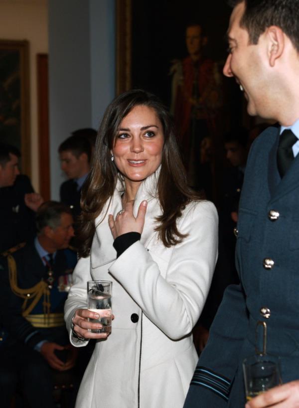 Kate Middleton laughs with a graduate at the Central Flying School at RAF Cranwell wher<em></em>e Prince William received his RAF wings in a graduation ceremony, in Sleaford on April 11, 2008 in Lincolnshire, England.