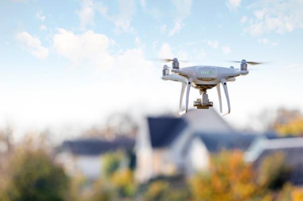 Homeowners insurance companies are dro<em></em>pping clients from their policies using aerial surveillance images taken by drones, according to a report.