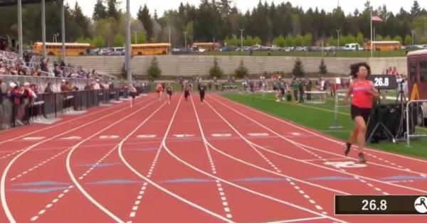 Aayden Gallagher is seen passing the finish line.