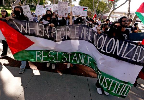 Pro-Palestinian marchers at Cal State Long Beach defended the Hamas attacks as acts of resistance against colo<em></em>nizers 