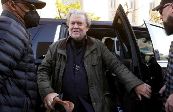 Steve Bannon gets out of a car
