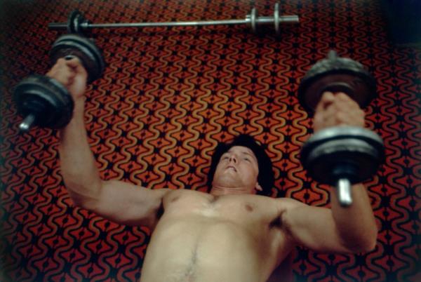 Christopher Reeve lifting weights. 