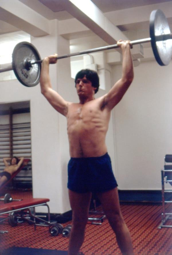 Christopher Reeve lifting weights. 