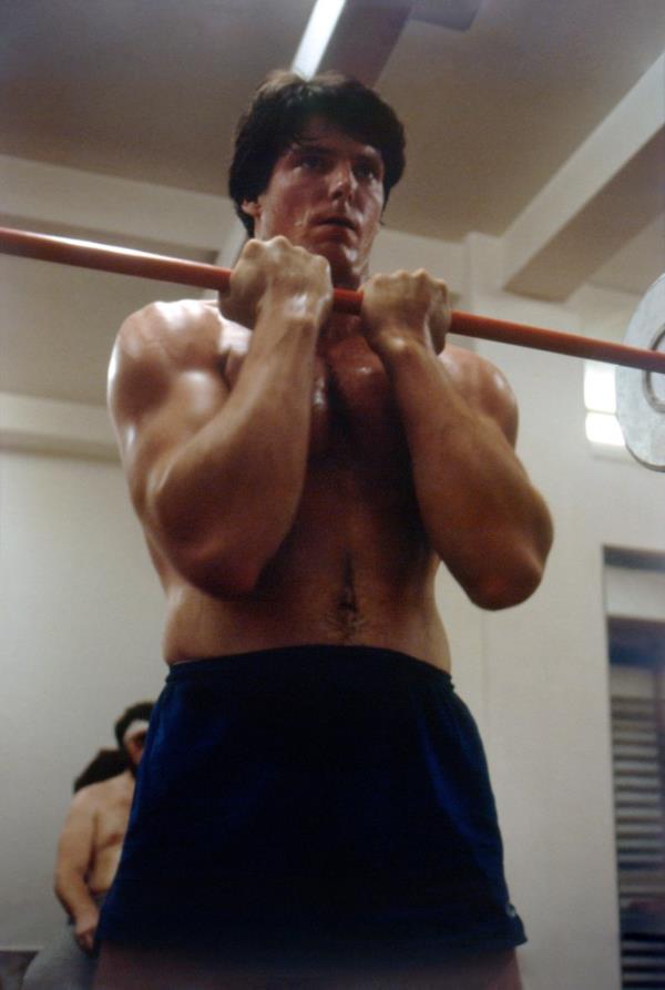Christopher Reeve lifting weights. 
