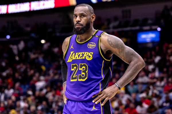 Los Angeles Lakers forward LeBron James (23) looks on against the New Orleans Pelicans during the first half at Smoothie King Center.