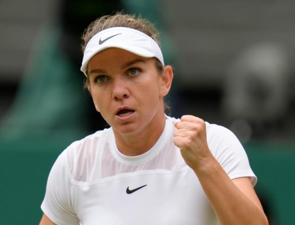 Romania's Simona Halep reacts to a shot.