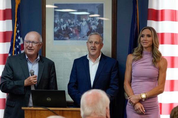 Michigan Republican Party Chairman Pete Hoekstra, left, Republican Natio<em></em>nal Committee Co-chair Michael Whatley and Co-chair Lara Trump take questions at the Oakland County GOP Headquarters, Friday, June 14, 2024 in Bloomfield Hills, Michigan