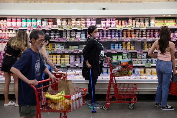 People shop in a supermarket