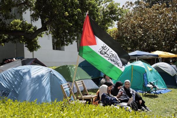 The encampment at Berkeley has students flying the Palestinian flag near their tents.