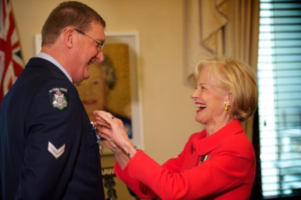 Mark Tregellas receiving the Humane Society bravery medal in 2011 from then governor-general Quentin Bryce AC.