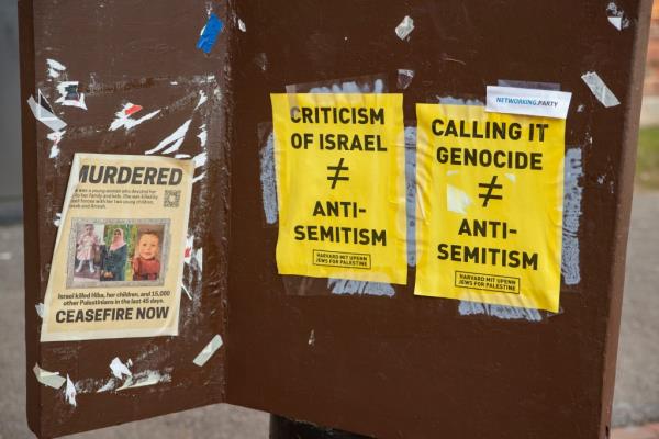 Dueling protests signs at Harvard