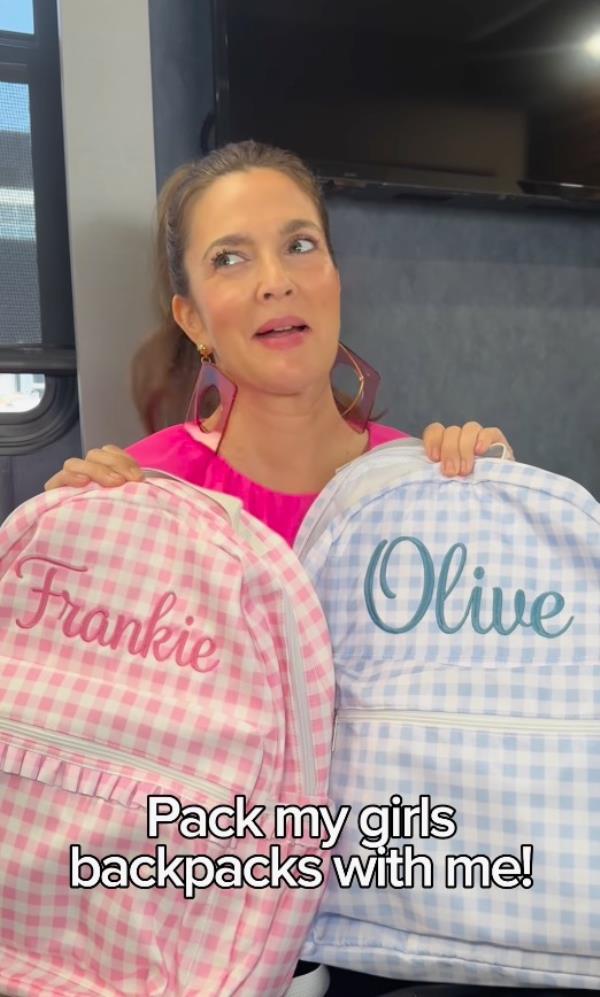 Drew Barrymore in an instagram video packing her kids' backpacks.