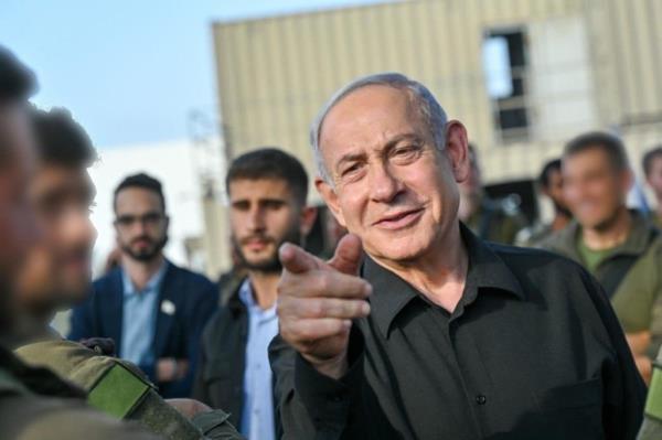 Israeli Prime Minister Benjamin Netanyahu visited troops in northern Gaza on Monday.
