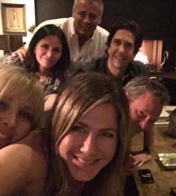 Jennifer Aniston, David Schwimmer, and Matt LeBlanc posing for a group selfie with other Friends cast members on Instagram