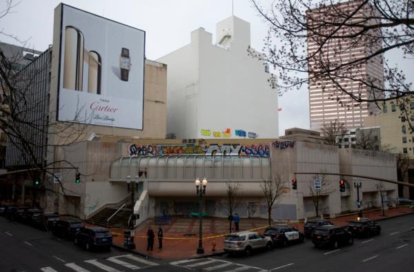 Dozens of Portland, Ore. police officers descended on the vacant Washington Center building in downtown Portland the morning of Wednesday, April 12, 2023, in what they said was a mission to clear out the dilapidated structure that has become home to an open-air drug market. 