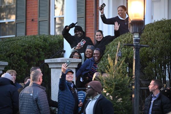 Biden poses for selfies during his stroll in Nantucket.