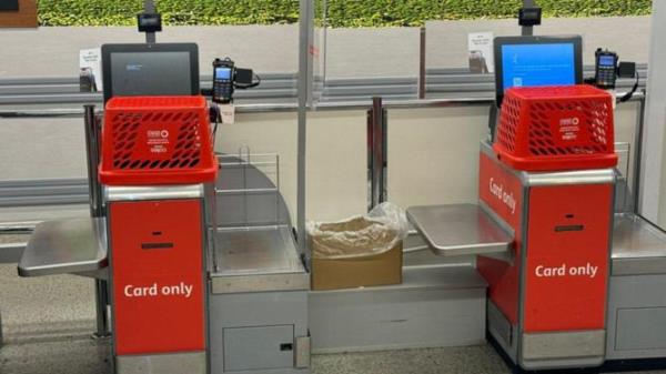 Coles covered its checkouts with baskets after the systems went down. Picture: Twitter