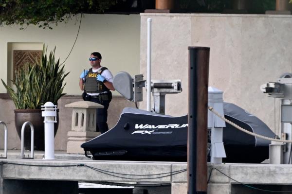 Law enforcement at Diddy's Star Island mansion in Miami Beach during raid over alleged sex trafficking