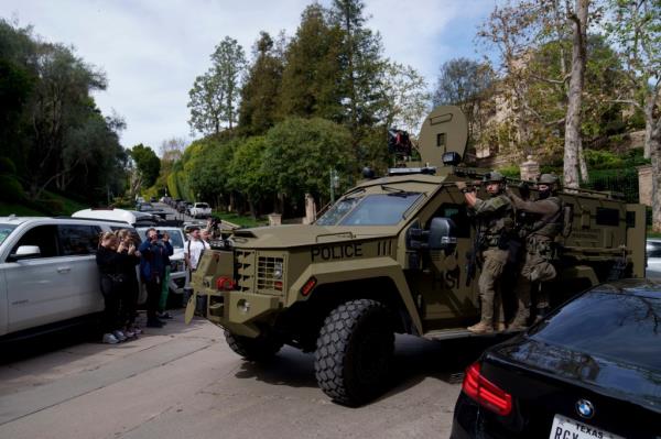 Law enforcement rides a vehicle near a property belo<em></em>nging to Sean 