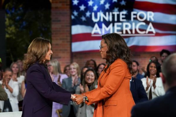 Oprah Winfrey greets Democratic presidential nominee and U.S. Vice President Kamala Harris at a campaign event in Detroit, Michigan, U.S., September 19, 2024.