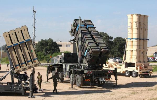 Soldiers walk near missile defense systems during Juniper Cobra, a joint US-Israel ballistic missile defense exercise, at Hatzor Israeli Air Force ba<em></em>se in central Israel, on February 25, 2016.