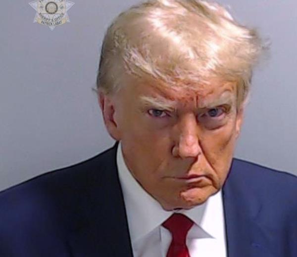 Do<em></em>nald Trump’s mug shot after being arrested is now being immortalized in a bobblehead.