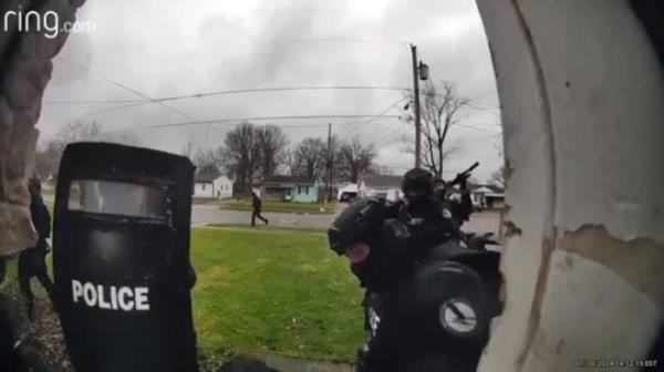 A ring camera recorded the moment that police busted through the door of the home 