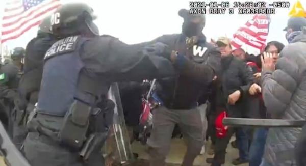 US-NEWS-CAPITOL-RIOT-DETROIT-FOOTBALL-PLAYER-1-MCT