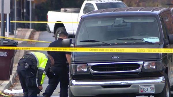 van in school crash surrounded by police tape