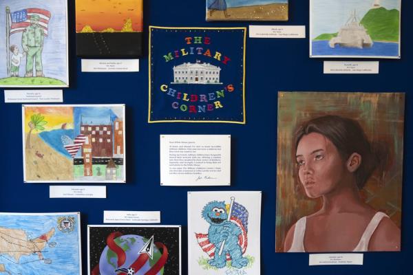 Artwork by military children decorates a display in the East Colo<em></em>nnade of the East Wing at the White House, Tuesday, Sept. 26, 2023, in Washington.