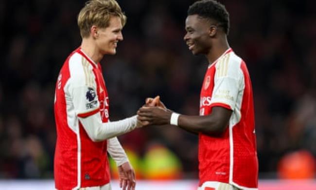 Martin ?degaard and Bukayo Saka 